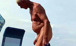 Naturist grandfather at the beach - 2