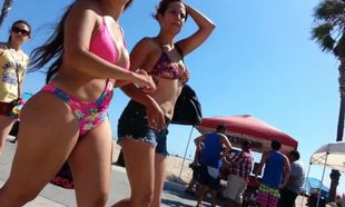 Candid latina in swimsuit with hefty..